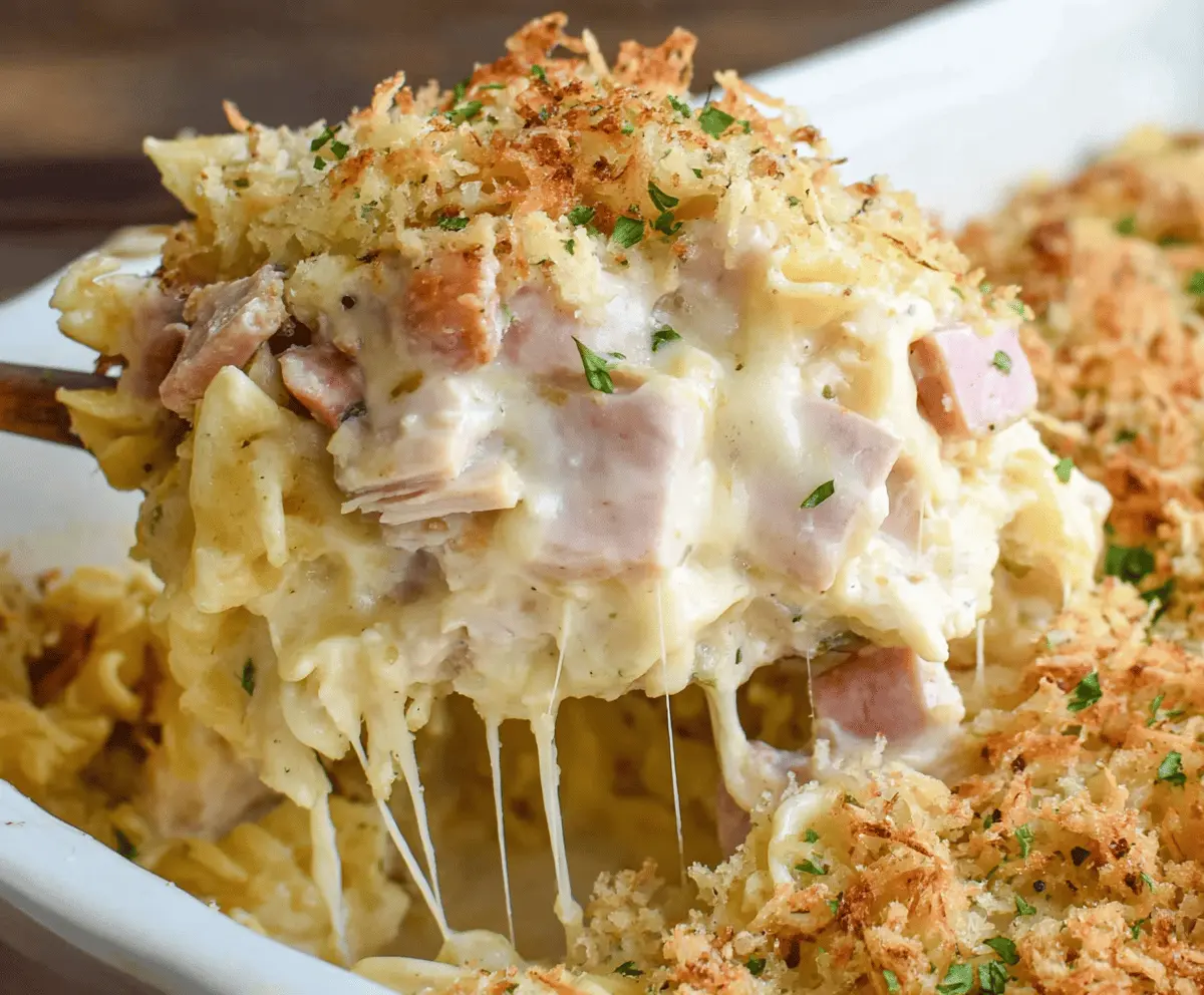 Delicious Chicken Cordon Bleu Casserole with crispy breaded chicken, ham, and melted cheese served in a baking dish