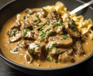 Creamy Gordon Ramsay Beef Stroganoff served with tender beef strips, mushrooms, and rich sauce on a plate, perfect for a hearty dinner.