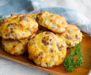 Delicious keto sausage and cheese biscuits served on a plate for breakfast.